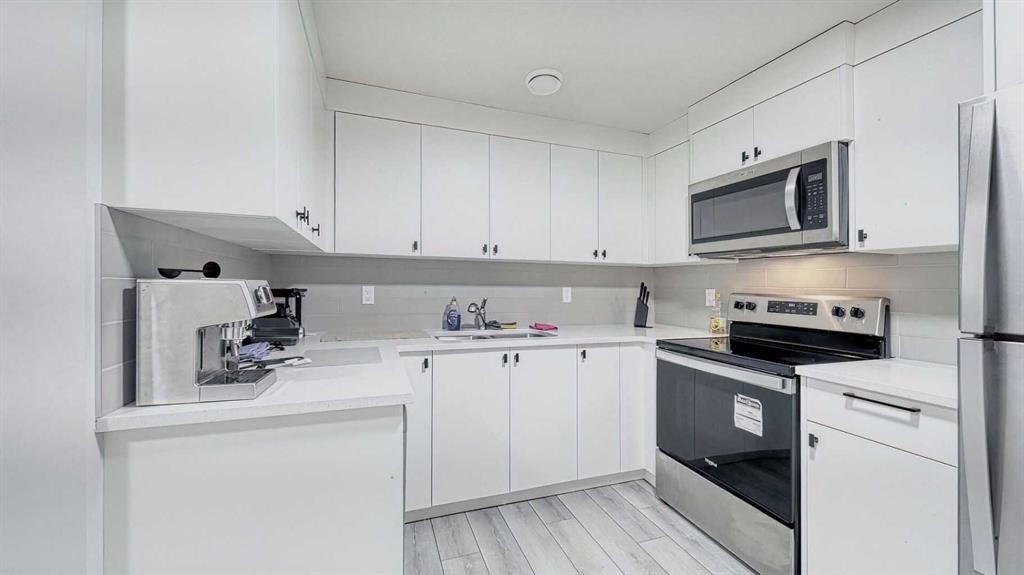 67 Setonstone Row Se, Calgary, AB - Indoor Photo Showing Kitchen With Stainless Steel Kitchen