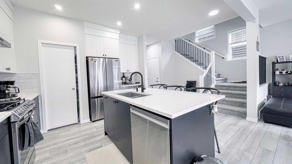 67 Setonstone Row Se, Calgary, AB - Indoor Photo Showing Kitchen With Stainless Steel Kitchen With Double Sink With Upgraded Kitchen
