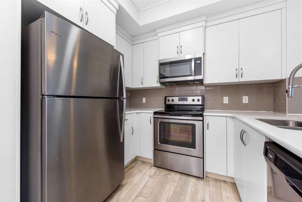 316-20 Seton Park Se, Calgary, AB - Indoor Photo Showing Kitchen With Stainless Steel Kitchen
