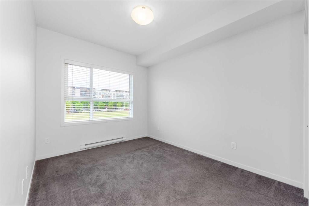 316-20 Seton Park Se, Calgary, AB - Indoor Photo Showing Other Room