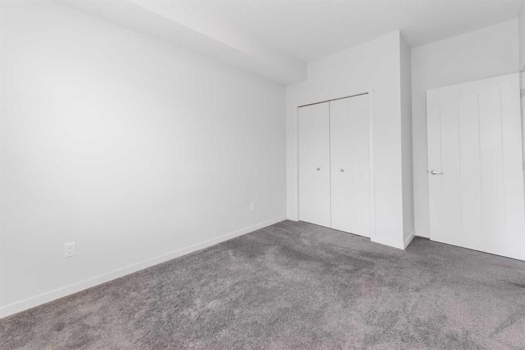 316-20 Seton Park Se, Calgary, AB - Indoor Photo Showing Other Room