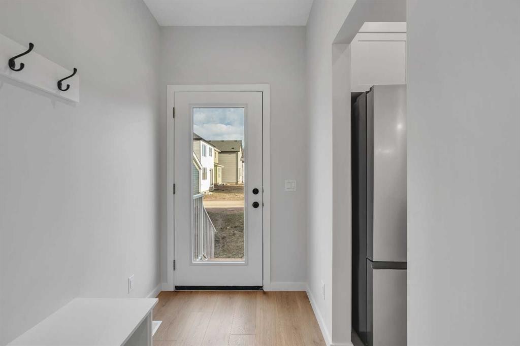 229 Heirloom Way Se, Calgary, AB - Indoor Photo Showing Other Room
