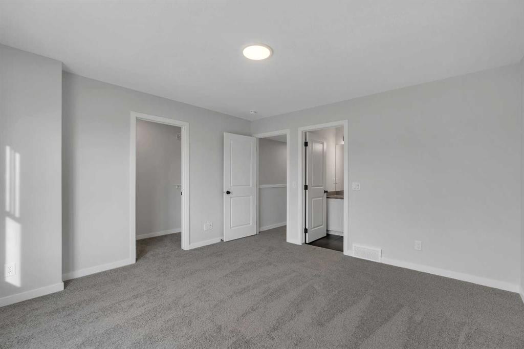 229 Heirloom Way Se, Calgary, AB - Indoor Photo Showing Other Room