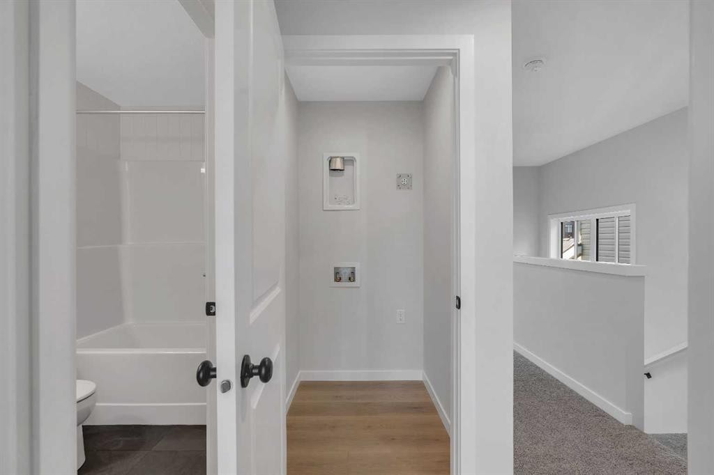 229 Heirloom Way Se, Calgary, AB - Indoor Photo Showing Bathroom