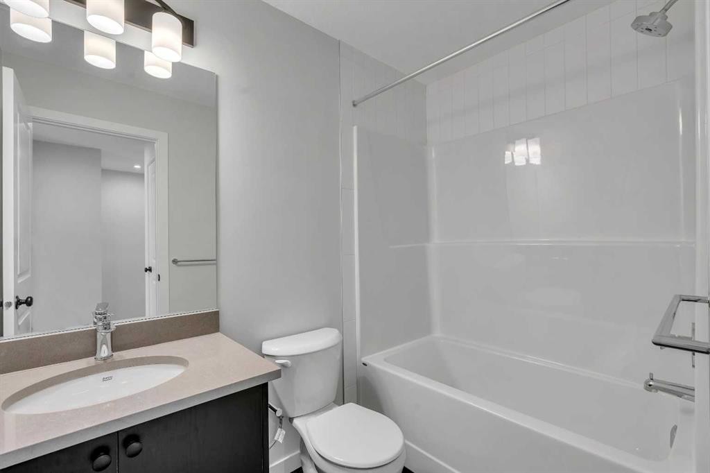 229 Heirloom Way Se, Calgary, AB - Indoor Photo Showing Bathroom