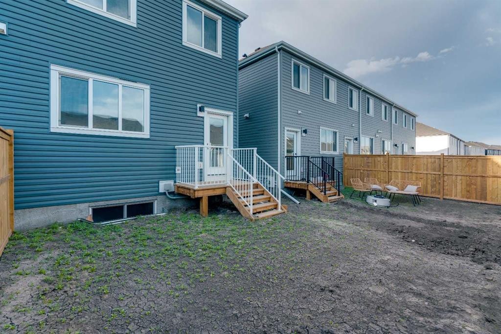 229 Heirloom Way Se, Calgary, AB - Outdoor With Exterior