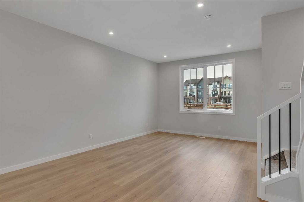 229 Heirloom Way Se, Calgary, AB - Indoor Photo Showing Other Room