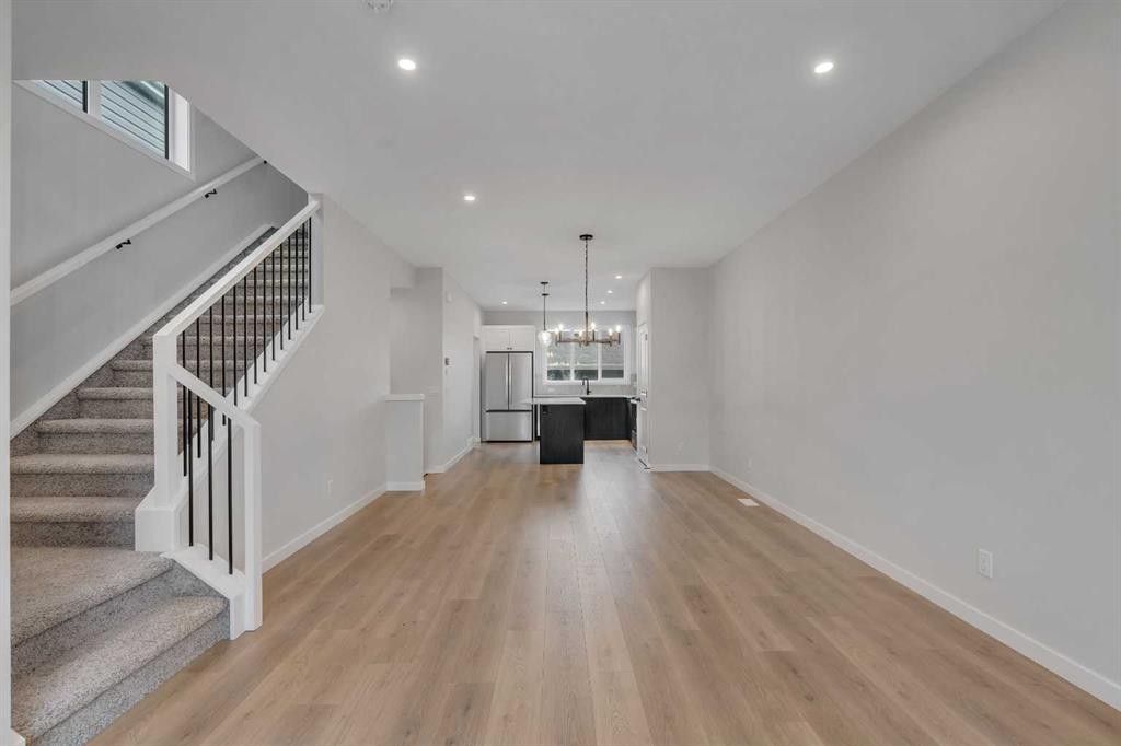 229 Heirloom Way Se, Calgary, AB - Indoor Photo Showing Other Room