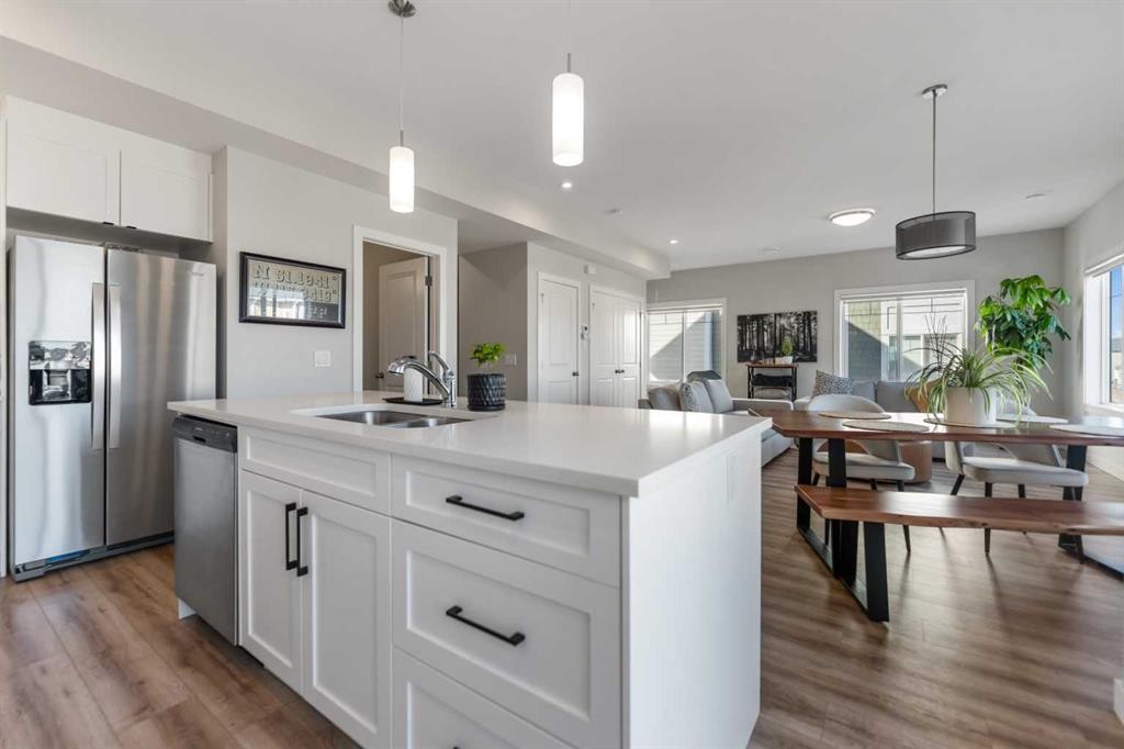 258 Canals Crossing Sw, Airdrie, AB - Indoor Photo Showing Kitchen With Double Sink With Upgraded Kitchen