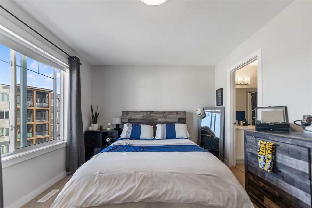 258 Canals Crossing Sw, Airdrie, AB - Indoor Photo Showing Bedroom