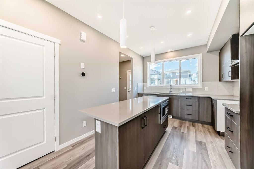 1342 Mahogany Boulevard Se, Calgary, AB - Indoor Photo Showing Kitchen With Upgraded Kitchen