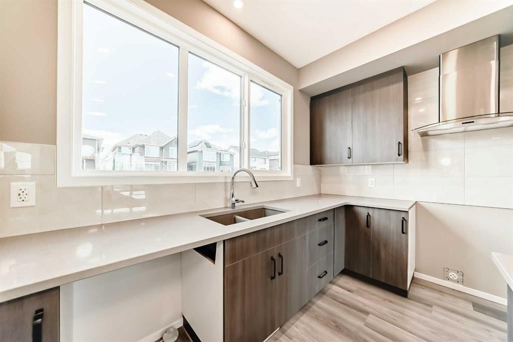 1342 Mahogany Boulevard Se, Calgary, AB - Indoor Photo Showing Kitchen With Double Sink