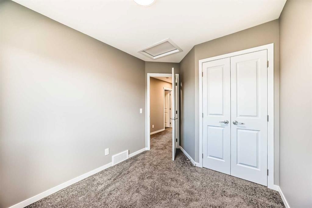 1342 Mahogany Boulevard Se, Calgary, AB - Indoor Photo Showing Other Room