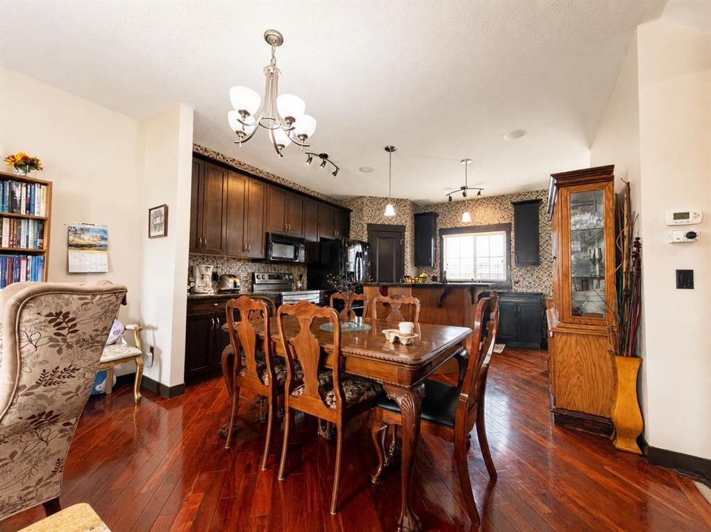 288 Rainbow Falls Drive, Chestermere, AB - Indoor Photo Showing Dining Room
