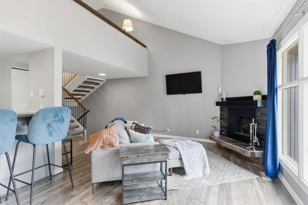 57-2225 Oakmoor Drive Sw, Calgary, AB - Indoor With Fireplace