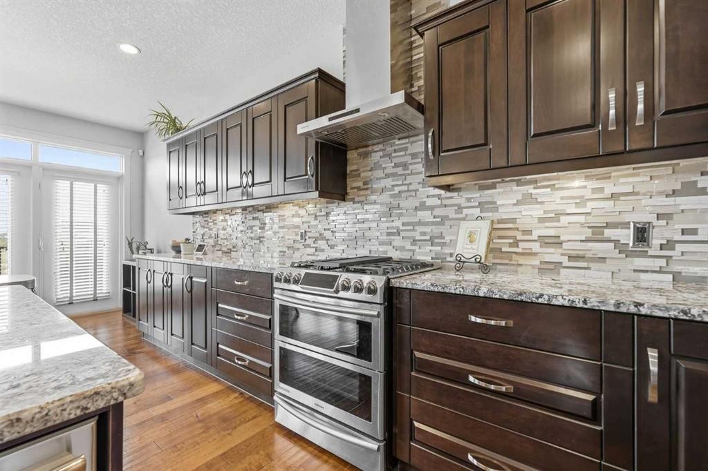 127 Marquis Grove Se, Calgary, AB - Indoor Photo Showing Kitchen With Upgraded Kitchen