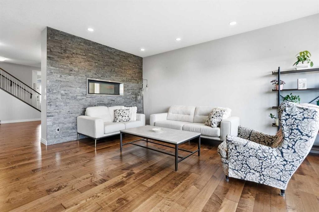 127 Marquis Grove Se, Calgary, AB - Indoor Photo Showing Living Room With Fireplace
