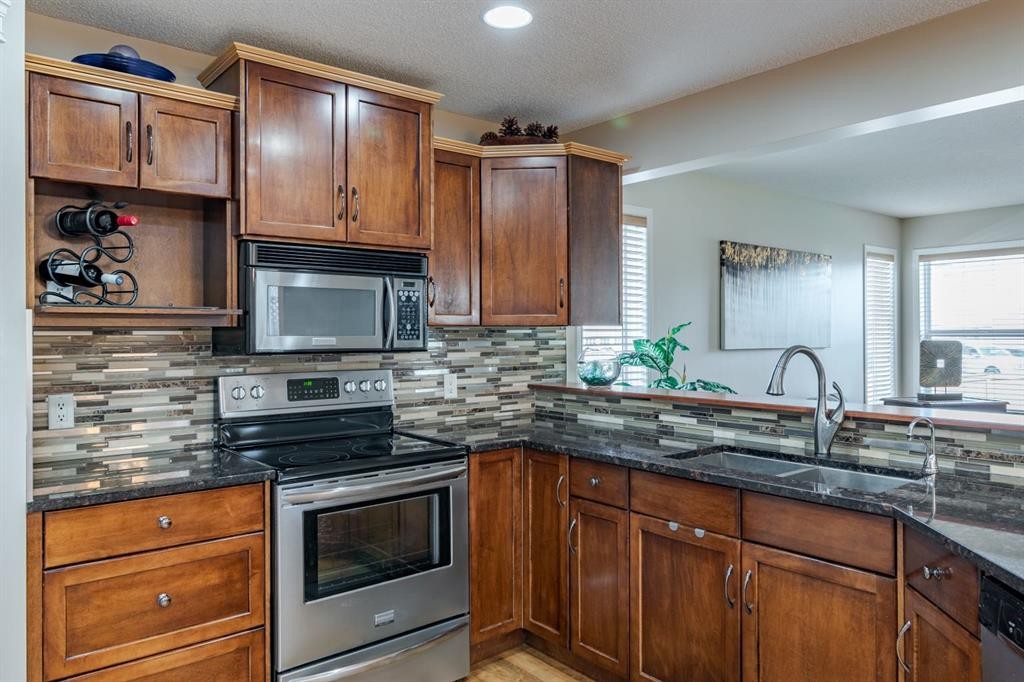 6 Cranwell Link Se, Calgary, AB - Indoor Photo Showing Kitchen With Double Sink