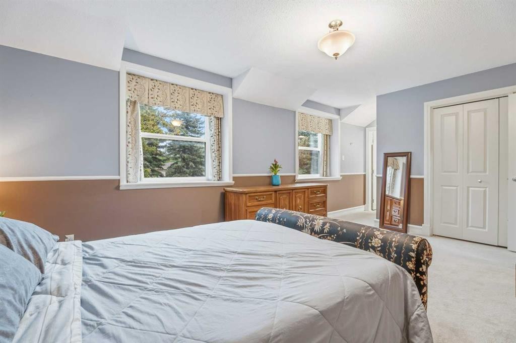 411 Wilderness Place Se, Calgary, AB - Indoor Photo Showing Bedroom