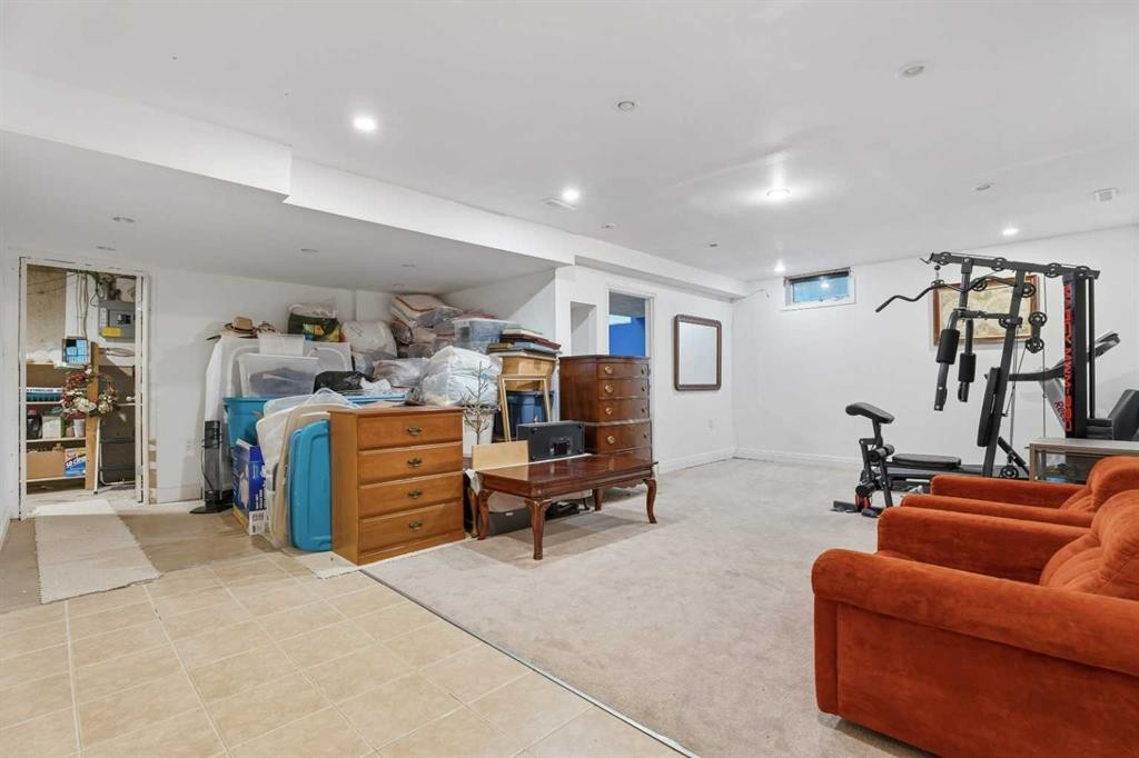 411 Wilderness Place Se, Calgary, AB - Indoor Photo Showing Gym Room