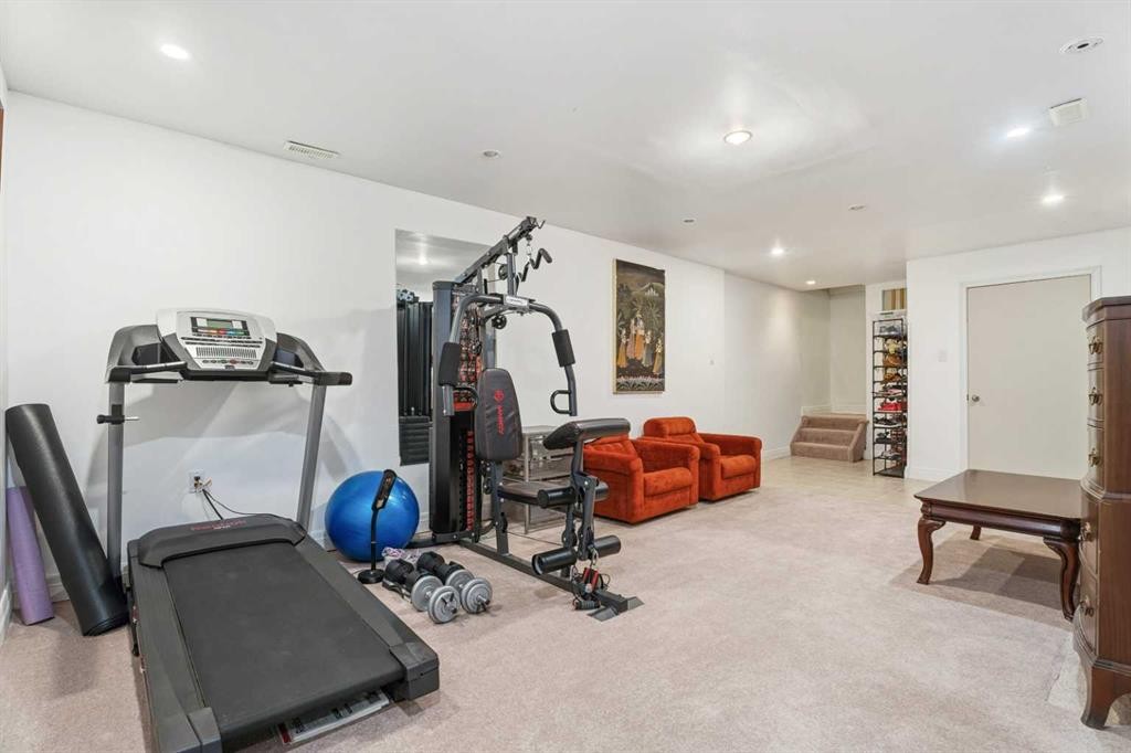 411 Wilderness Place Se, Calgary, AB - Indoor Photo Showing Gym Room