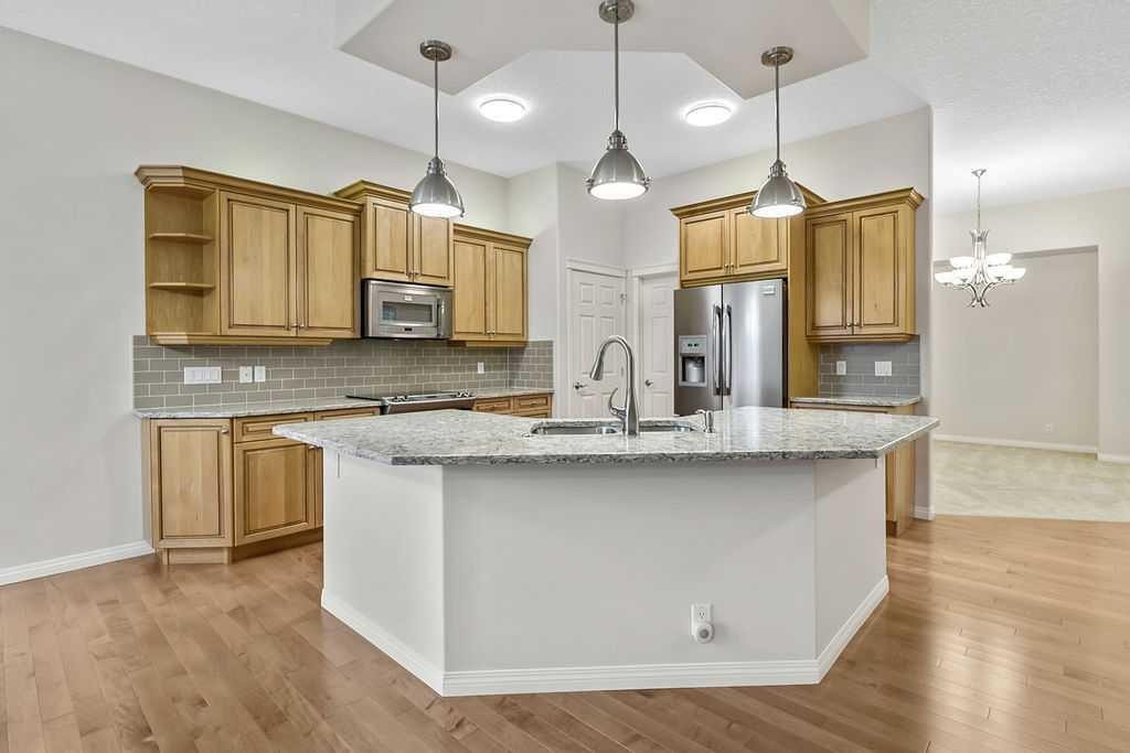 41 Cranston Drive Se, Calgary, AB - Indoor Photo Showing Kitchen With Upgraded Kitchen