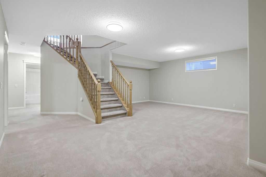 41 Cranston Drive Se, Calgary, AB - Indoor Photo Showing Basement