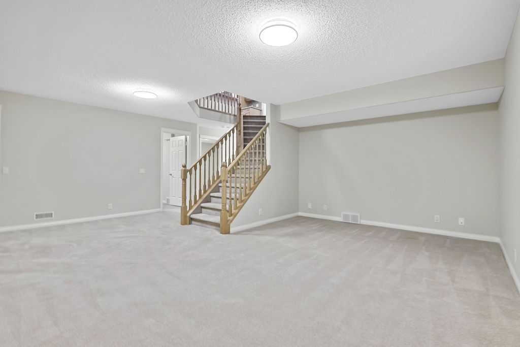 41 Cranston Drive Se, Calgary, AB - Indoor Photo Showing Other Room