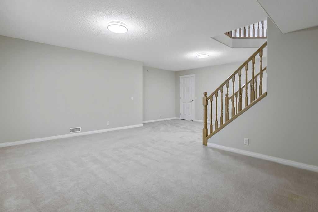 41 Cranston Drive Se, Calgary, AB - Indoor Photo Showing Other Room