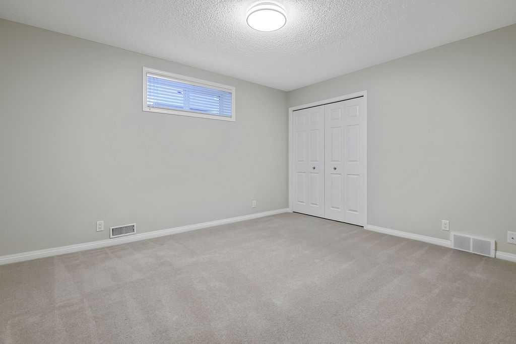 41 Cranston Drive Se, Calgary, AB - Indoor Photo Showing Other Room