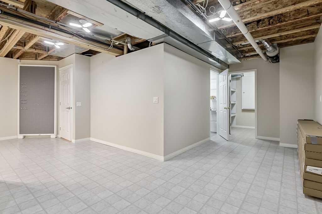 41 Cranston Drive Se, Calgary, AB - Indoor Photo Showing Basement