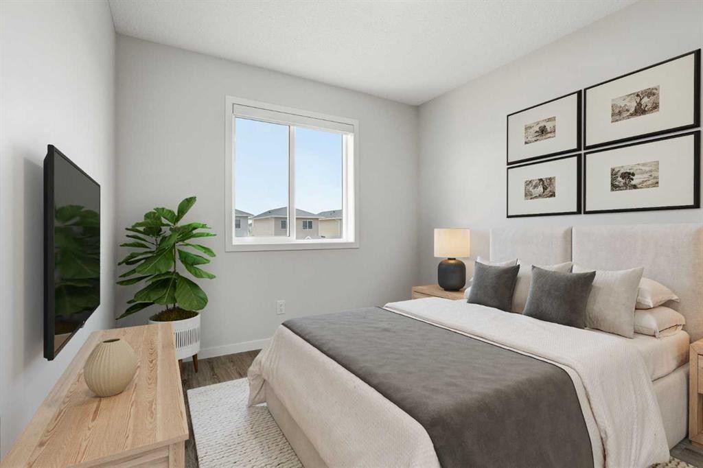 352 Dawson Drive, Chestermere, AB - Indoor Photo Showing Bedroom