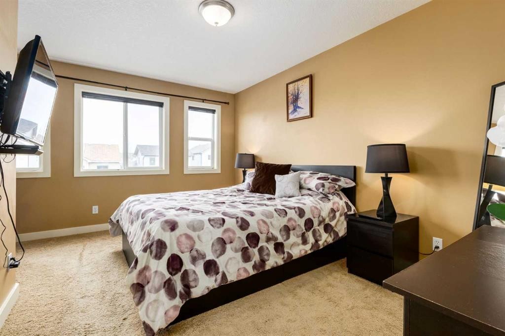 159 Cimarron Grove Crescent, Okotoks, AB - Indoor Photo Showing Bedroom
