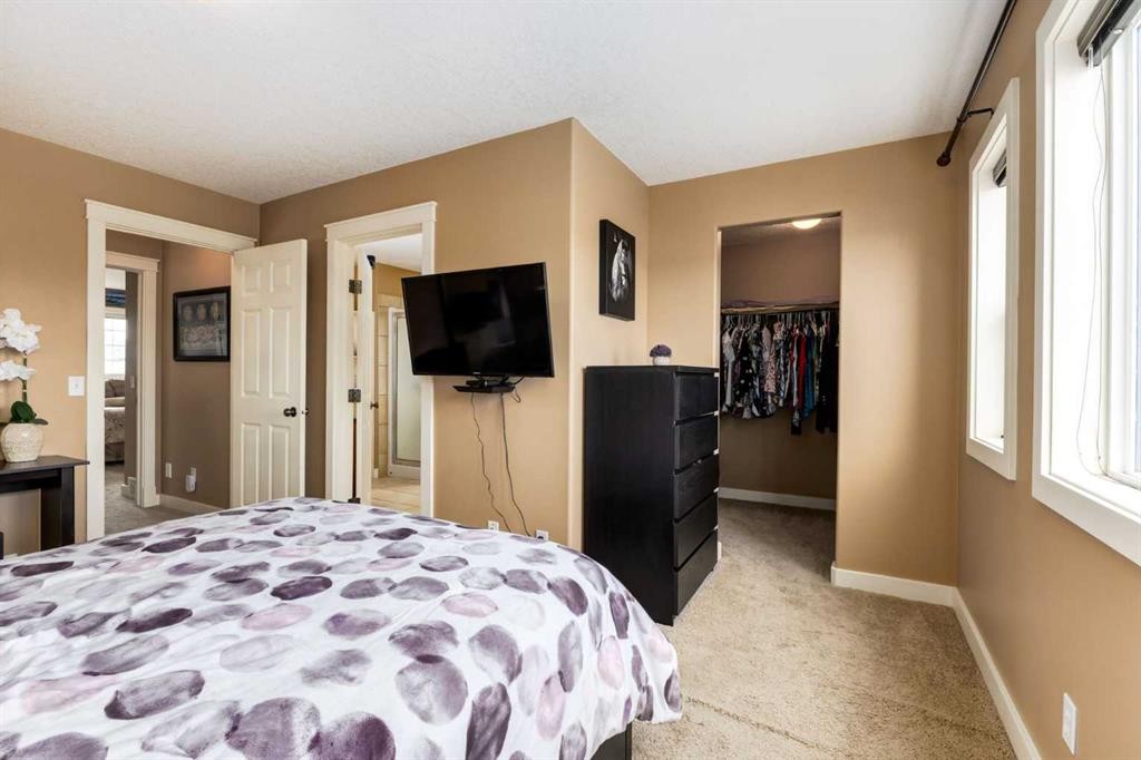 159 Cimarron Grove Crescent, Okotoks, AB - Indoor Photo Showing Bedroom