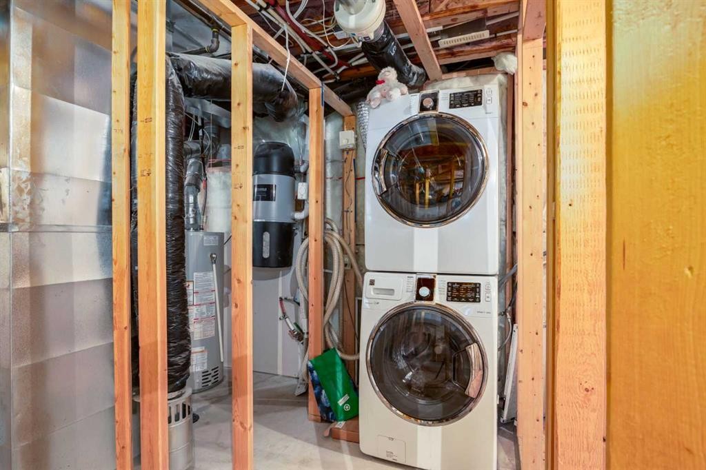 159 Cimarron Grove Crescent, Okotoks, AB - Indoor Photo Showing Laundry Room