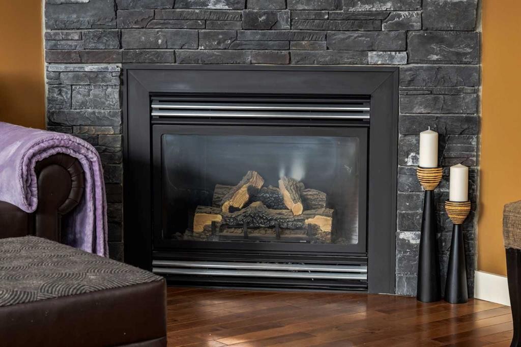159 Cimarron Grove Crescent, Okotoks, AB - Indoor Photo Showing Living Room With Fireplace
