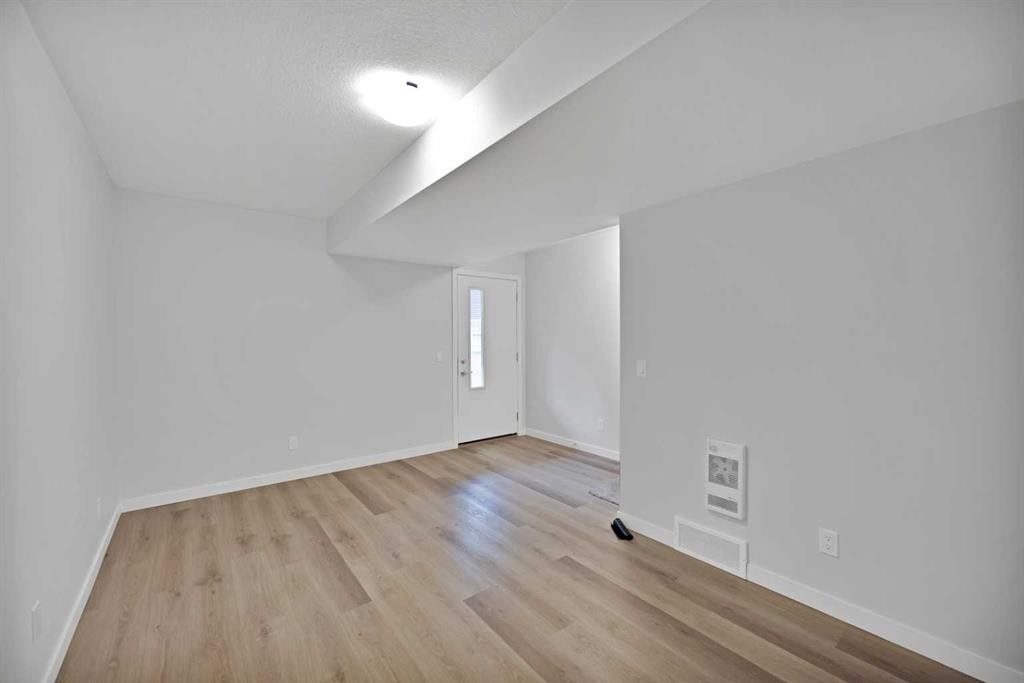 411-301 Redstone Boulevard Ne, Calgary, AB - Indoor Photo Showing Other Room