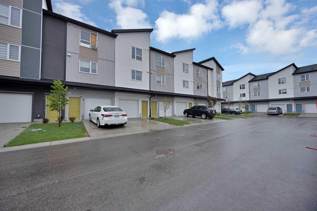 411-301 Redstone Boulevard Ne, Calgary, AB - Outdoor With Facade