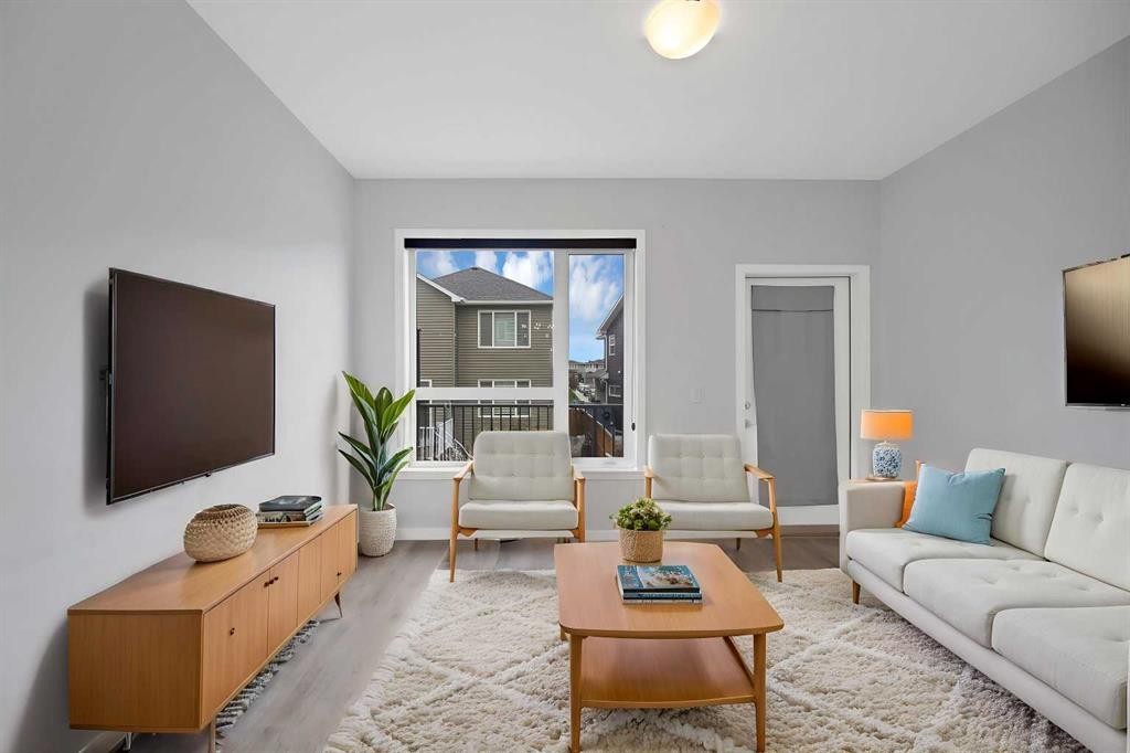 411-301 Redstone Boulevard Ne, Calgary, AB - Indoor Photo Showing Living Room