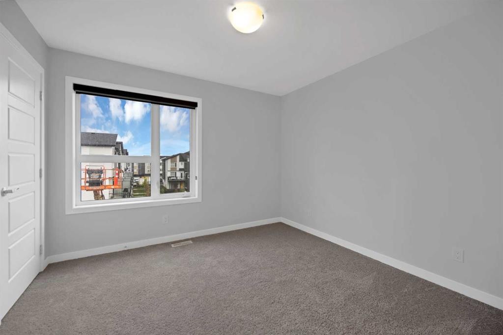 411-301 Redstone Boulevard Ne, Calgary, AB - Indoor Photo Showing Other Room