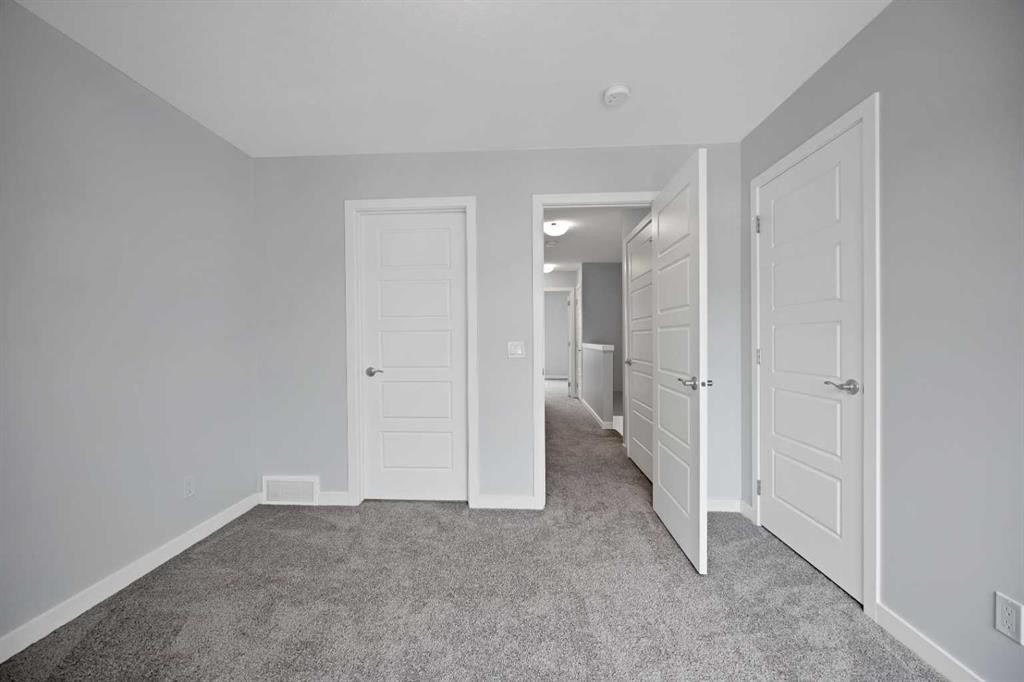 411-301 Redstone Boulevard Ne, Calgary, AB - Indoor Photo Showing Other Room