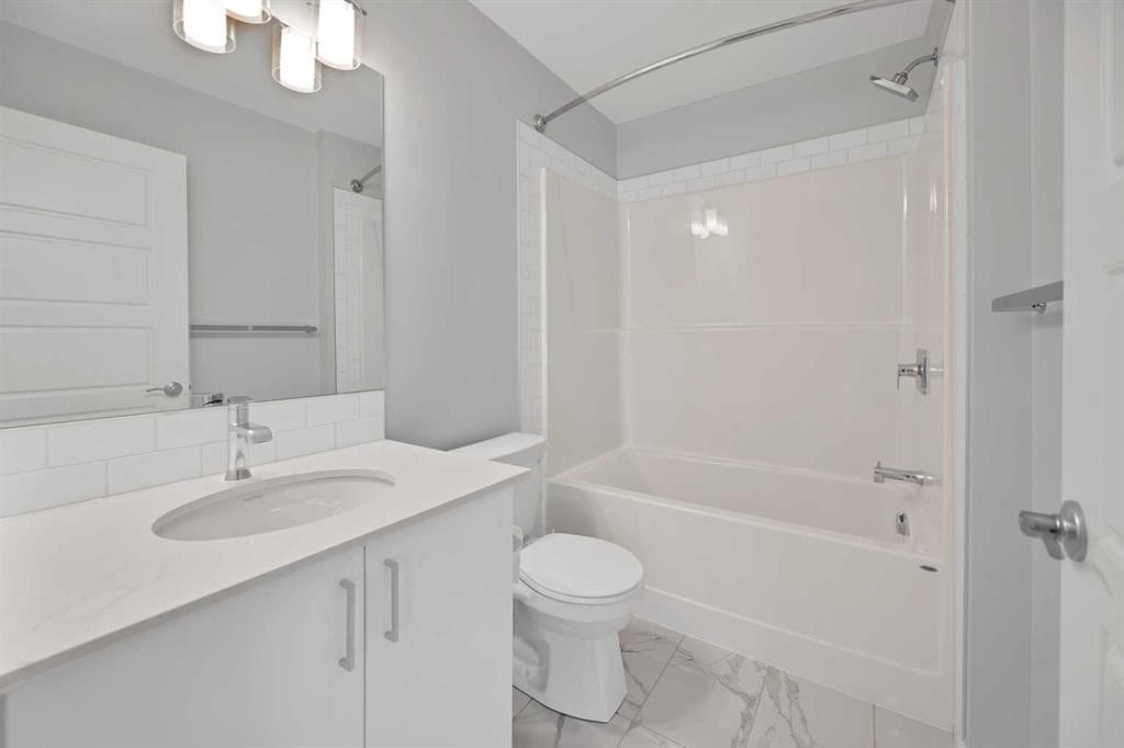 411-301 Redstone Boulevard Ne, Calgary, AB - Indoor Photo Showing Bathroom