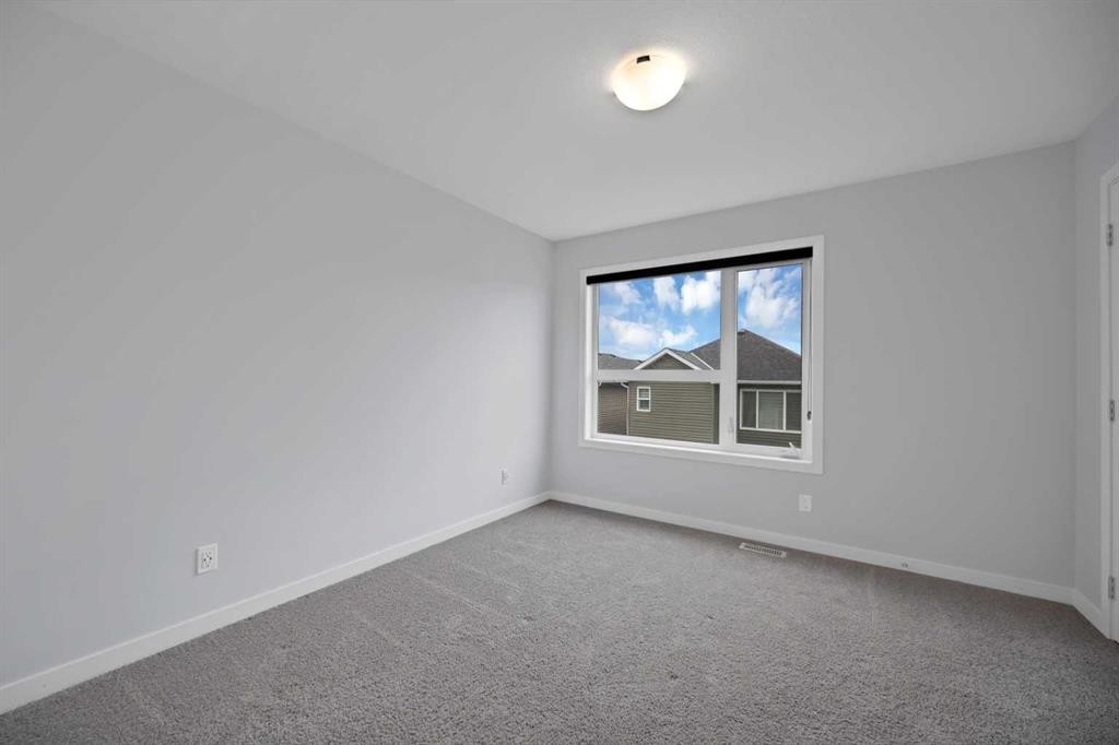 411-301 Redstone Boulevard Ne, Calgary, AB - Indoor Photo Showing Other Room