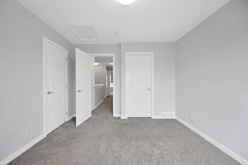 411-301 Redstone Boulevard Ne, Calgary, AB - Indoor Photo Showing Other Room