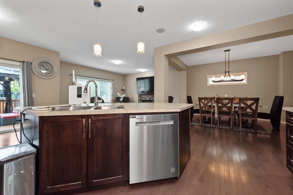 203 Morningside Circle Sw, Airdrie, AB - Indoor Photo Showing Kitchen With Double Sink