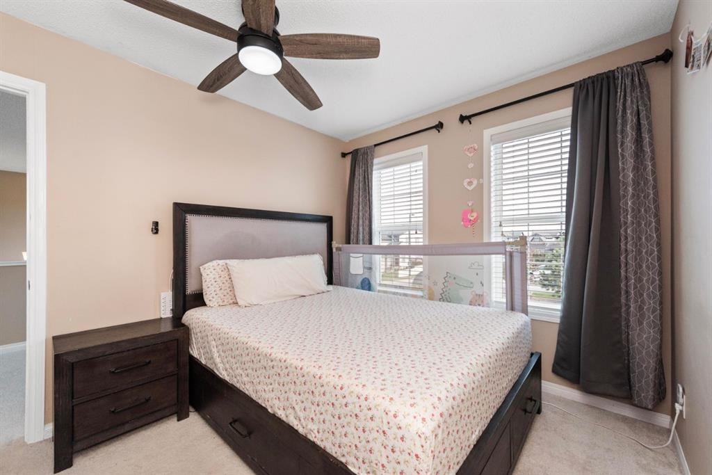 203 Morningside Circle Sw, Airdrie, AB - Indoor Photo Showing Bedroom