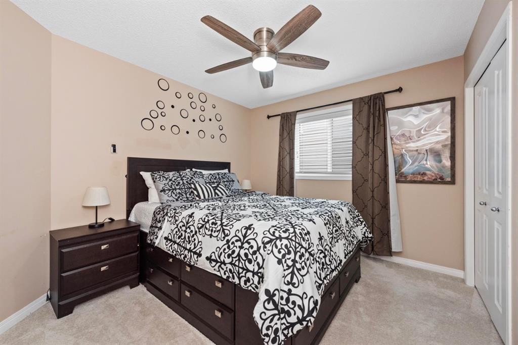 203 Morningside Circle Sw, Airdrie, AB - Indoor Photo Showing Bedroom