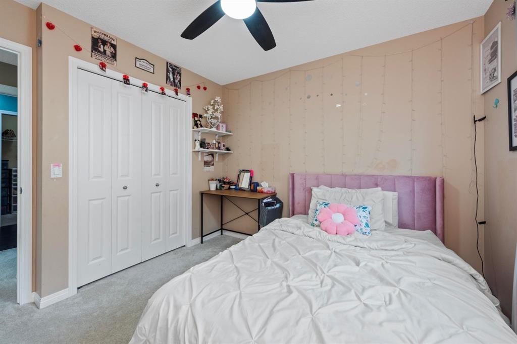 203 Morningside Circle Sw, Airdrie, AB - Indoor Photo Showing Bedroom