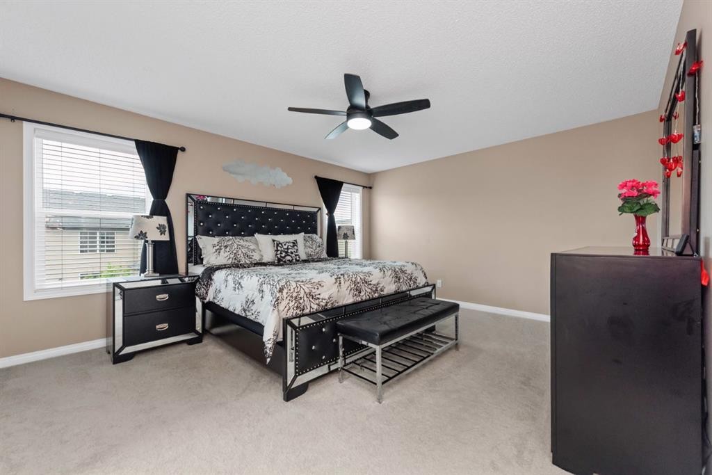 203 Morningside Circle Sw, Airdrie, AB - Indoor Photo Showing Bedroom