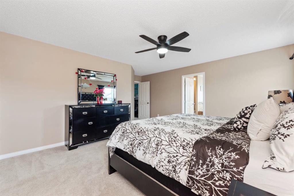 203 Morningside Circle Sw, Airdrie, AB - Indoor Photo Showing Bedroom